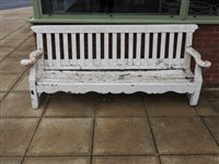 Lot 263 - A painted wood garden bench, 19th century,...