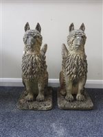 Lot 265 - A pair of carved stone wyverns, 19th century,...