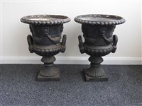 Lot 603 - A pair of cast iron campana urns, 19th...