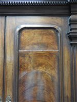 Lot 104 - A George III mahogany bureau cabinet, circa...