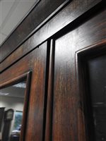 Lot 229 - A pair of Regency rosewood narrow bookcases,...