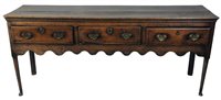 Lot 220 - A George III oak dresser base