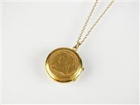 Lot 136 - A half sovereign set locket