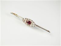 Lot 152 - A ruby and diamond bar brooch