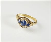Lot 203 - A sapphire and diamond cluster ring