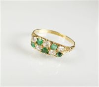 Lot 137 - An emerald and diamond ring