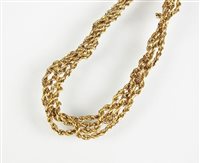 Lot 256 - A four strand chain