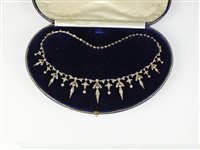 Lot 205 - A diamond tiara / necklace / bracelet