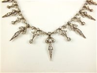 Lot 205 - A diamond tiara / necklace / bracelet