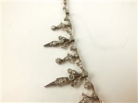 Lot 205 - A diamond tiara / necklace / bracelet