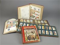 Lot 280 - Three cigarette card albums, two stamp albums and a Champion annual