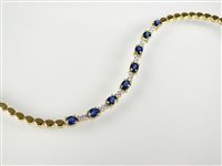 Lot 123 - A sapphire and diamond bracelet