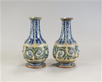 Lot 137 - A pair of Doulton Lambeth vases by Eliza Simmance