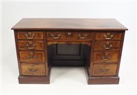 Lot 307 - An Edwardian pedestal desk