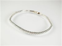 Lot 198 - A diamond set tennis bracelet