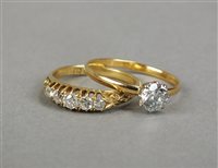 Lot 38 - An 18ct gold five stone diamond ring