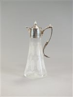 Lot 109 - A silver plated mounted claret jug