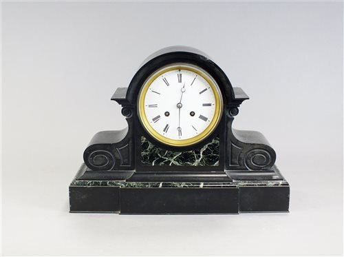 Lot 203 - A black marble and variegated marble mantle clock