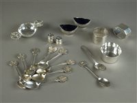 Lot 28 - Collection of silver teaspoons, salts, pepperettes, tea strainer and napkin rings