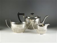 Lot 92 - A three piece silver tea service