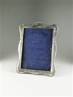 Lot 86 - An Edwardian silver mounted frame