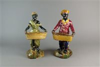 Lot 98 - A pair of Victorian majolica Blackamoor figures