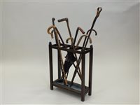 Lot 351 - A painted fire screen in the form of a basket of flowers
