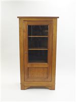 Lot 278 - An oak display cabinet