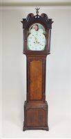 Lot 230 - A George III oak and mahogany crossbanded longcase clock