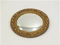 Lot 280 - A reproduction circular wall mirror