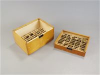 Lot 211 - Box containing 4 various light wood boxes containing brass letters and numbers