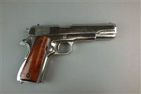 Lot 298 - A Denix replica of a chrome US ARMY M1911 autoloading pistol, .45 calibre