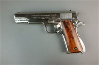 Lot 298 - A Denix replica of a chrome US ARMY M1911 autoloading pistol, .45 calibre