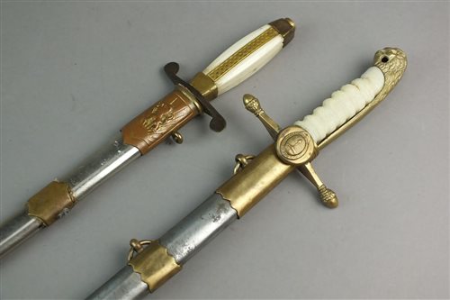 Lot 411 - An Argentinian Dagger and a Romanian dagger