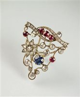 Lot 265 - A mutli-gem set brooch/pin