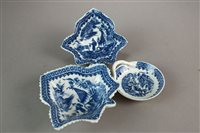 Lot 214 - A Caughley Fisherman pattern egg drainer and two pickle leaf dishes