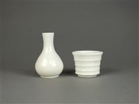 Lot 60 - A Chinese Dehua bottle vase and beaker