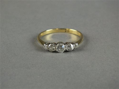 Lot 8 - A five stone diamond ring