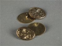 Lot 9 - A pair of 9ct gold cufflinks