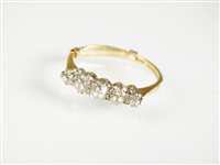 Lot 232 - A five stone diamond ring