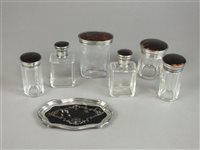 Lot 267 - A collection of silver and tortoiseshell mounted dressing table wears