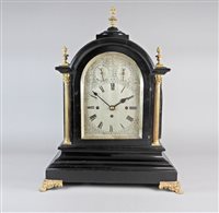 Lot 206 - A Victorian table clock in George III style