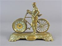 Lot 211 - A novelty brass desk timepiece