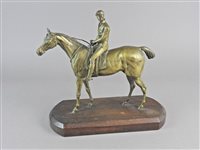Lot 140 - A Victorian cast brass study of a race horse jockey up, 19th century