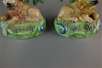 Lot 92 - A pair of Walton Staffordshire pearlware lions