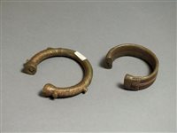 Lot 177 - A pair of copper bracelets, West African; 19th - 20th century AD