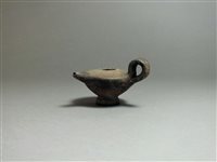 Lot 36 - Greek, ceramic oil pourer, 5th century BC