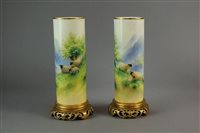 Lot 97 - A pair of Royal Worcester vases by Harry Davis