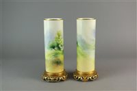 Lot 97 - A pair of Royal Worcester vases by Harry Davis