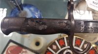 Lot 276 - A Japanese type 30 bayonet and metal scabbard